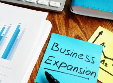 Note with business expansion on it.
